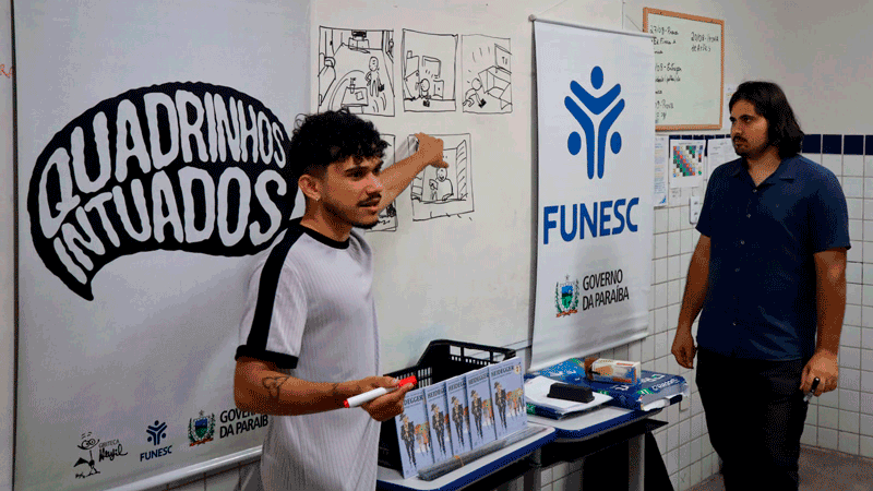 Vitor Daniel Cartaxo e Paulo Henrique Moreira ministrando oficina do Quadrosofia em escola pública